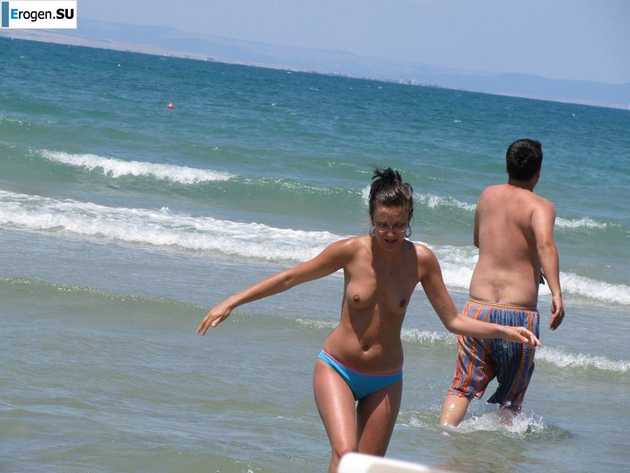 tanned girlfriends on a rocky shore. Photo 2